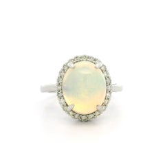 Classic Style Platinum 3.19ctw Oval Cabochon Opal w/ Diamond Halo Ring