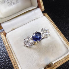 Classic Style Sapphire and Diamond Three Stone Ring in 18ct White Gold Setting