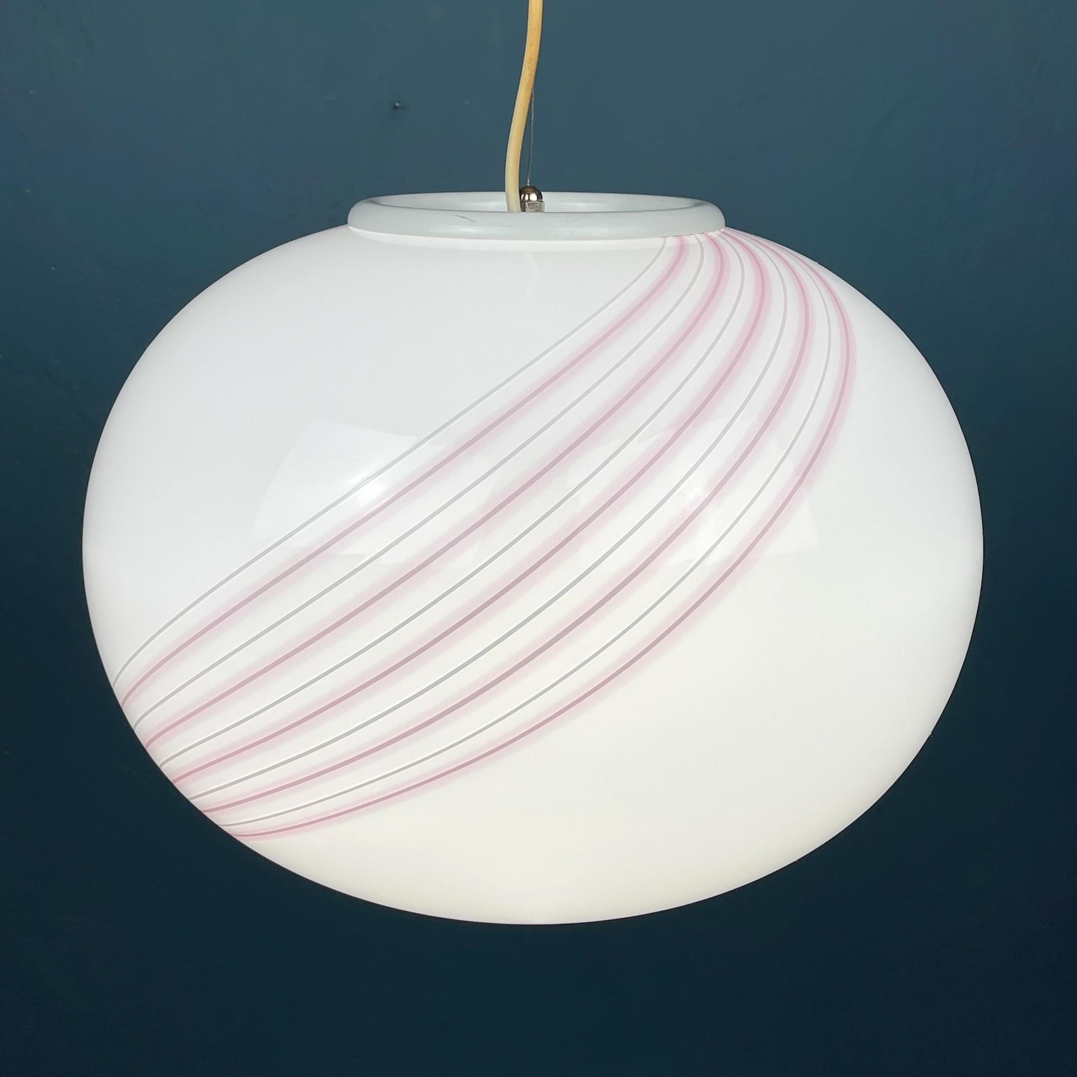 Classic swirl murano pendant lamp by Vetri Murano made in Italy in the 1970s. Very beautiful white Murano glass with bends in the form of a sphere. The lamp is in perfect condition, fully functional. No chips or cracks. Maximum height with cable 180