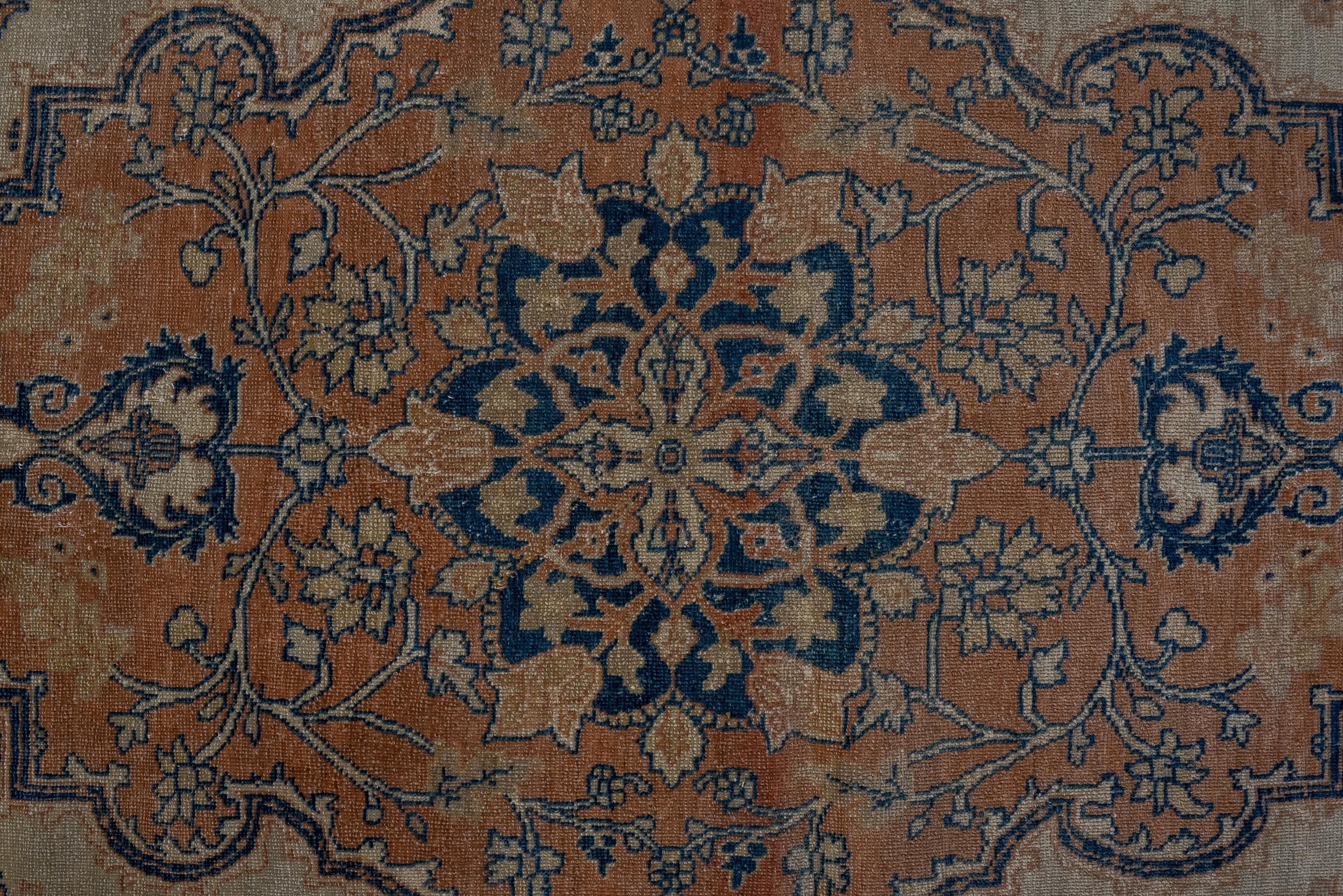 Hand-Knotted Classic Tabriz with Dark Blue Medallion and Tulip Design, Circa 1920's  For Sale