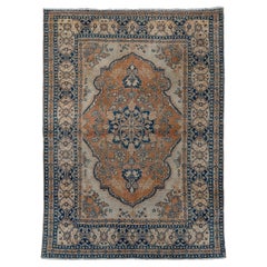 Antique Classic Tabriz with Dark Blue Medallion and Tulip Design, Circa 1920's 