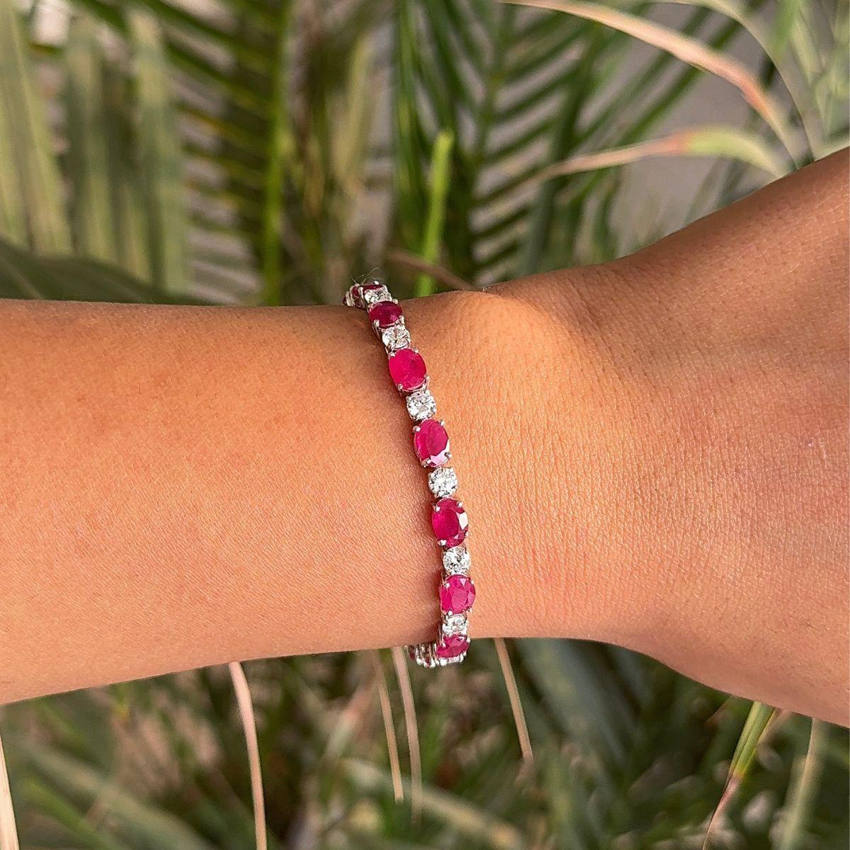 Modern Ruby and CZ Tennis Bracelet in sterling silver. You shall need statement tennis bracelet to make a statement with your look. Each piece features dazzling cubic zirconia stones, renowned for their brilliance and clarity, set in high-quality
