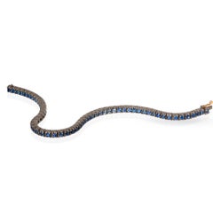 Classic Tennis Bracelet in Titanium, 18kt Red Gold and Blue Shaded Sapphires