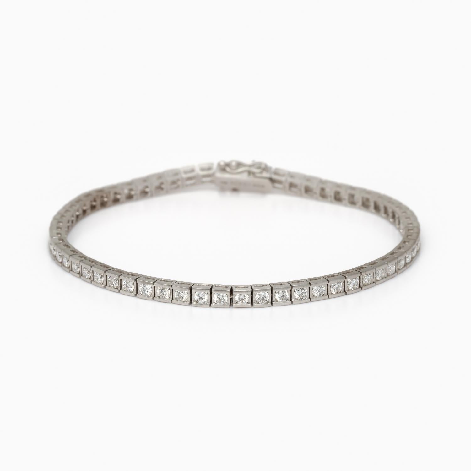 This bracelet is sturdy yet dainty and elegant. The most beautiful tennis bracelet on the market. Genuine Diamond Tennis Bracelet. It is thicker and bigger than it appears in the photos.

Solid 18k White Gold. 100% blended in house for a unique rosy