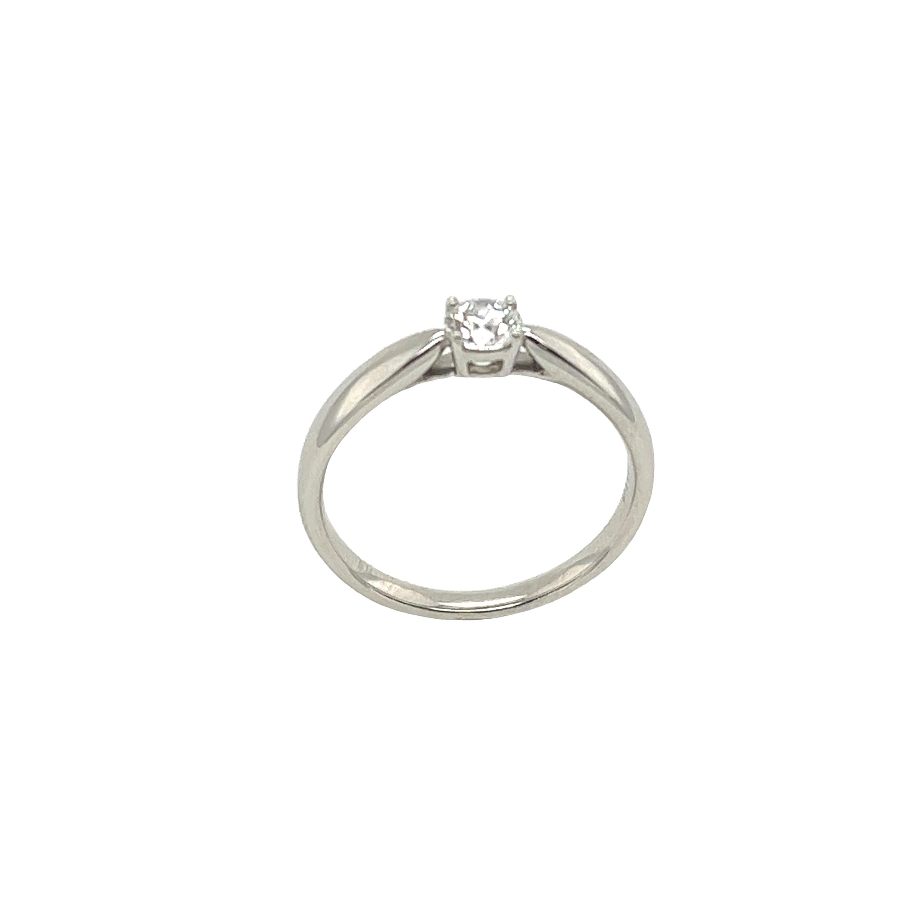 Round Cut Classic Tiffany & Co. Solitaire Diamond Ring in Platinum with a 0.22ct Diamond For Sale