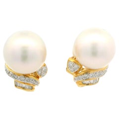 Klassische Timeless 18k Gelbgold 11.2mm Perle 0.34ctw Diamant Omega Ohrringe