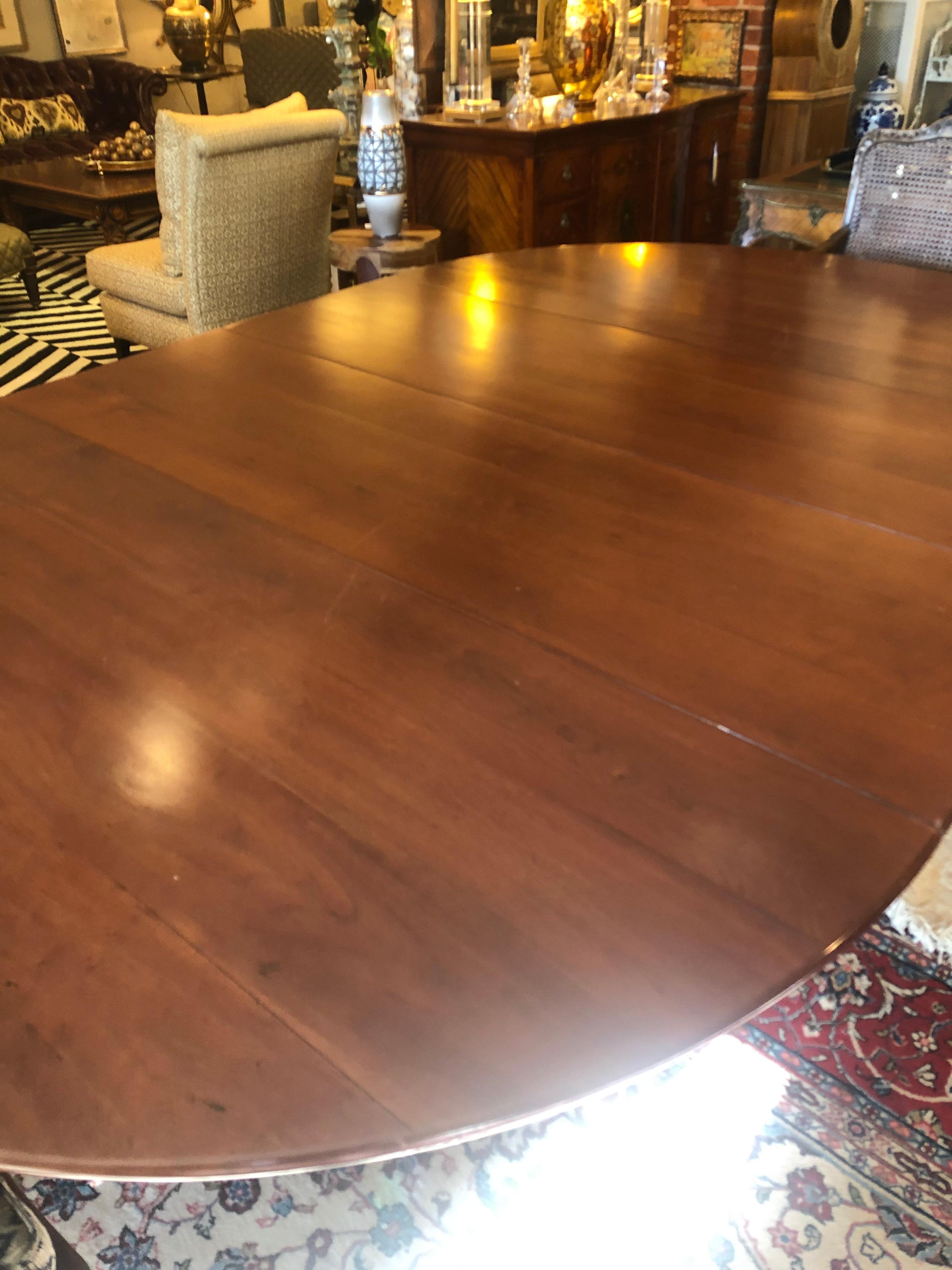 Classic Traditional Round Cherry Dining Table Extending to Large Oval 3