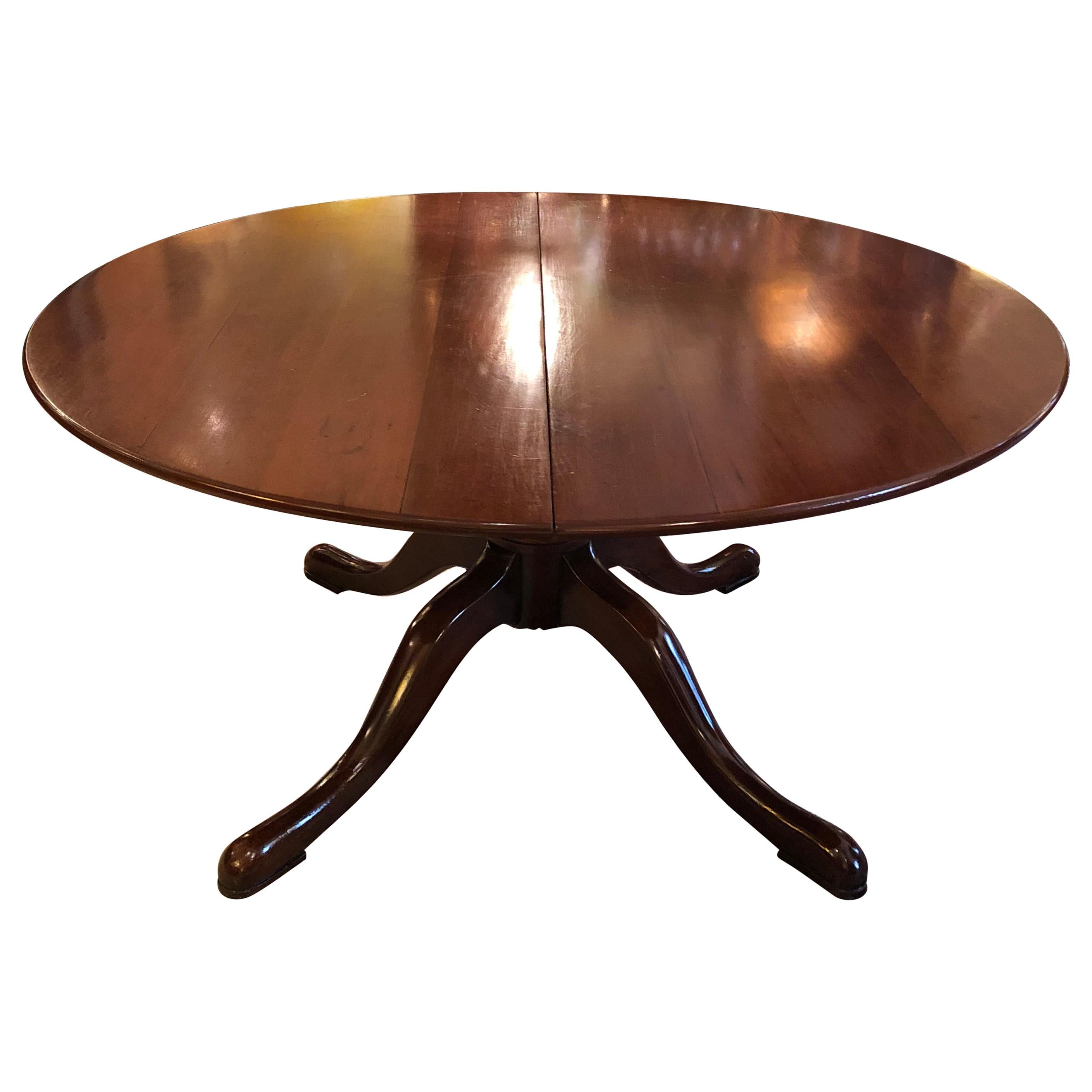 Classic Traditional Round Cherry Dining Table Extending to Large Oval