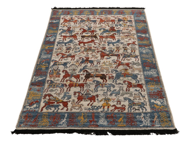 Exemplifying a contemporary take on rare tribal works, this 5x8 from Rug & Kilim’s Burano Collection showcases a pictorial pattern of horsemen & animals of rare inspiration. The nomadic theme boasts a delicious colorway of denim blue, brick red &