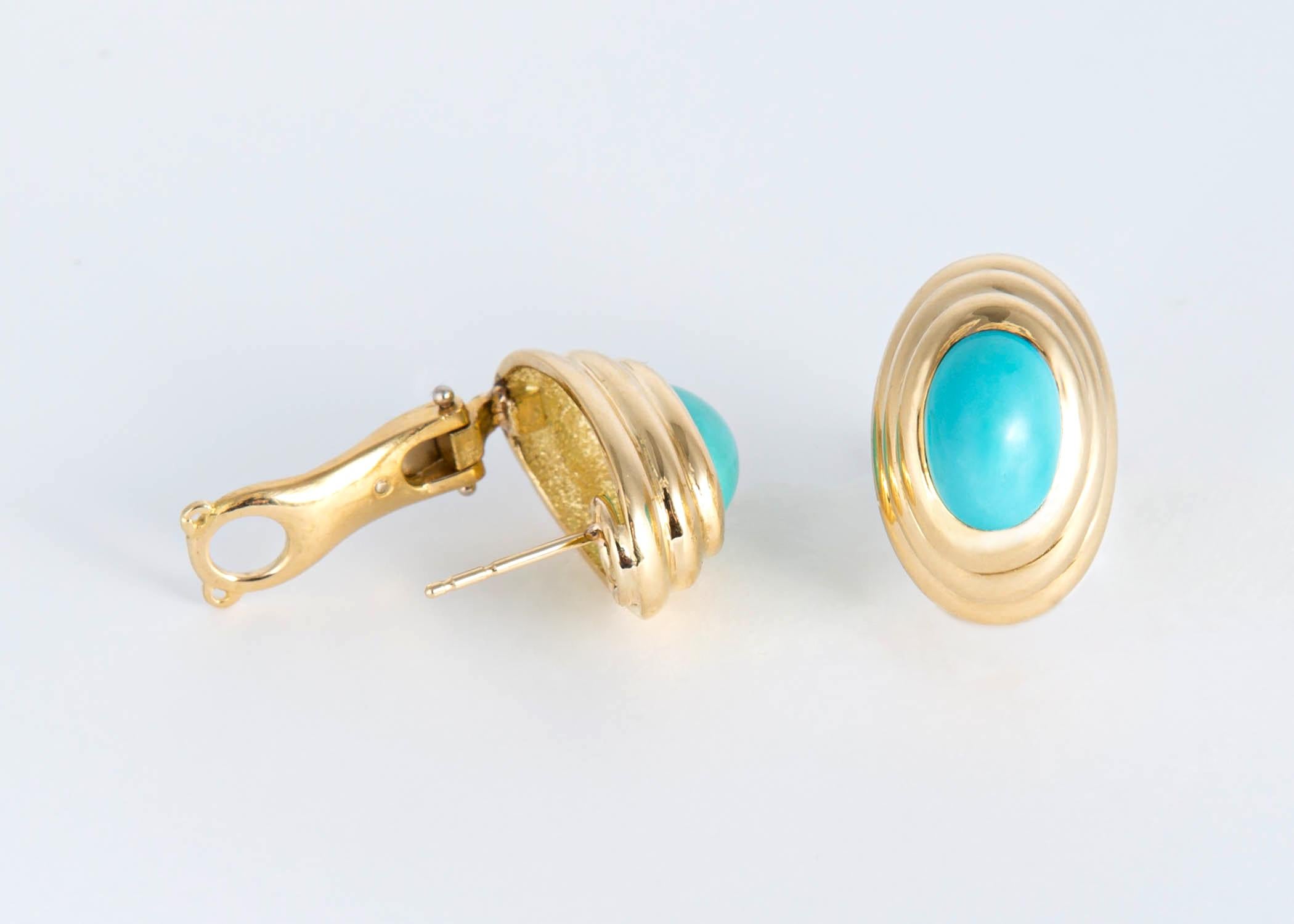 Wearable and classic. Rich turquoise is framed with a triple 18k yellow gold bezel. 3/4's of an inch in size.