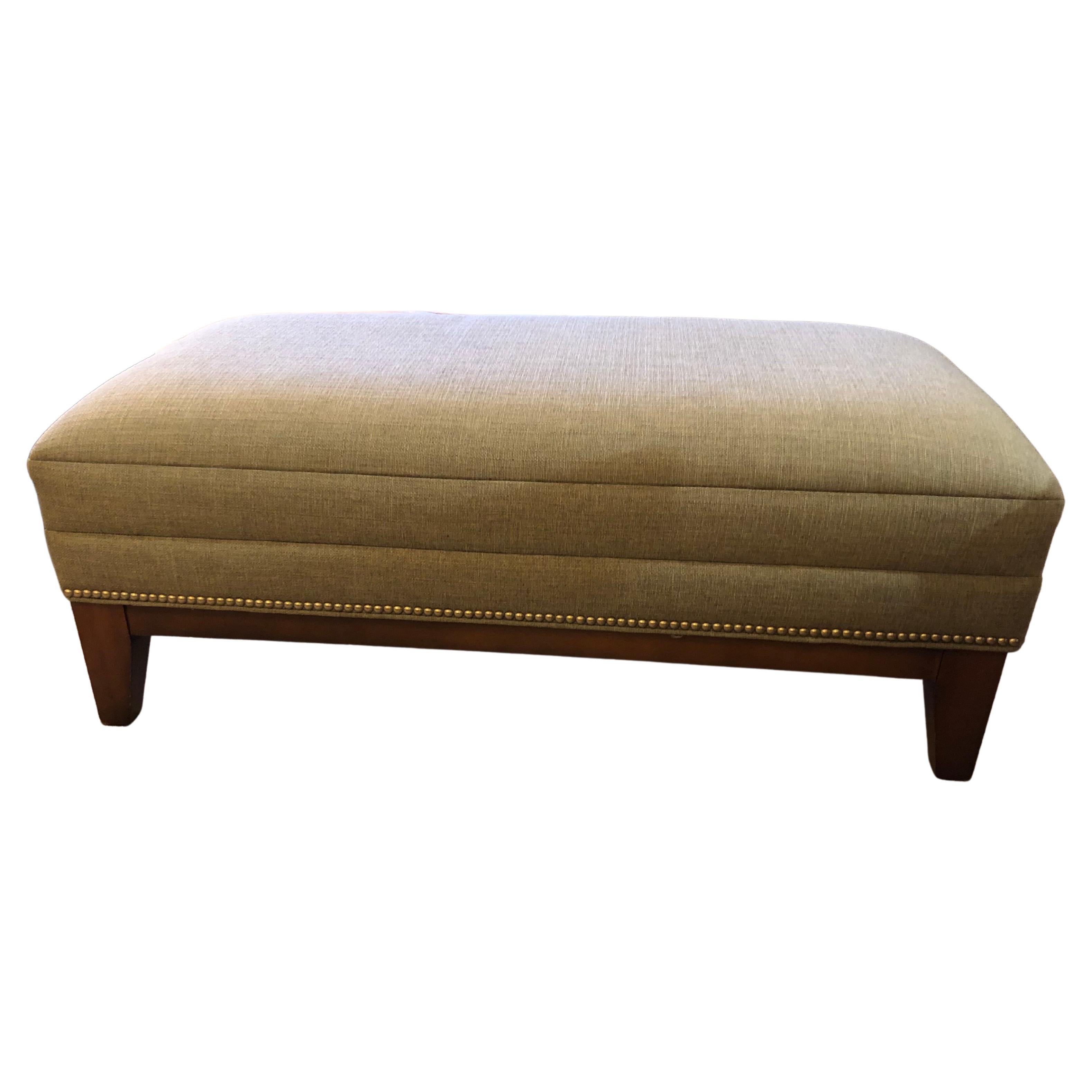 Classic Upholstered Greige Ottoman with Nailheads