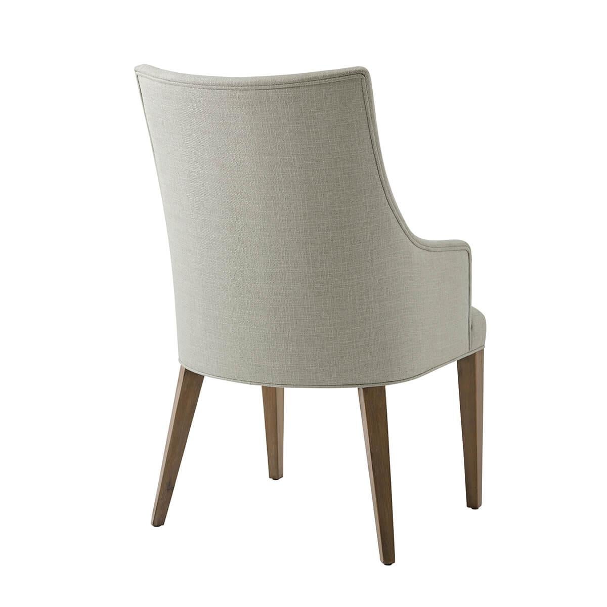 With an upholstered back, arm, and tight seat cushion, in the Draper performance fabric, with traditional square tapered legs in our light mangrove finish.

 
Dimensions: 22
