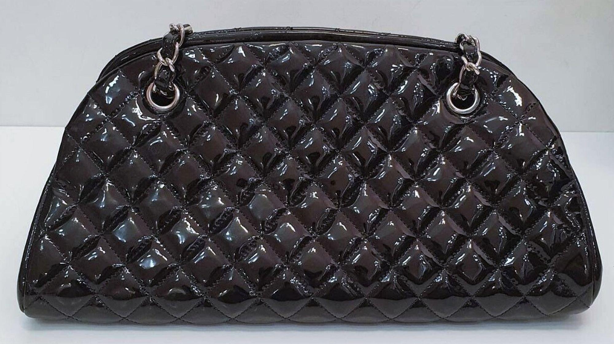 Classic Vintage Chanel Quilted Shoulder Bag - 

This Chanel patent leather diamond cut design. Silvered Chain with leather strap. The strap may be pulled completely to one side or used for a longer handbag look or may be pulled from both sides to