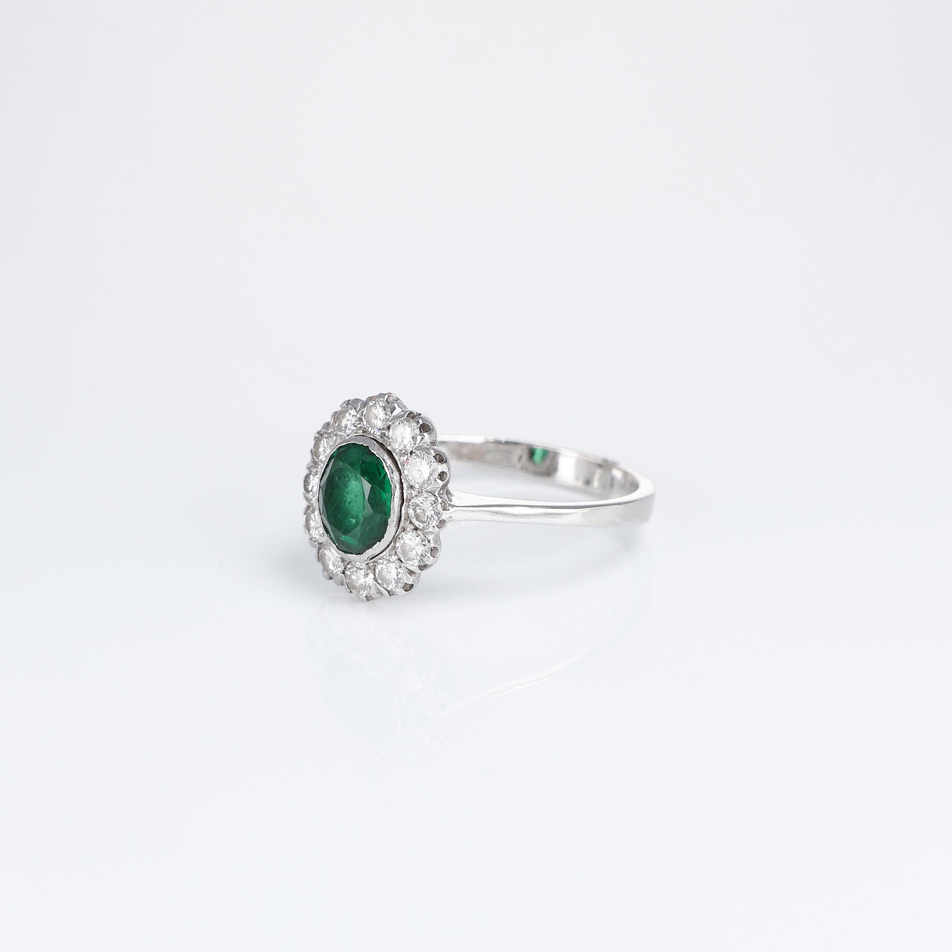 Brilliant Cut Classic Vintage Halo Ring Oval Emerald 0.45 carats and White Diamond White Gold For Sale