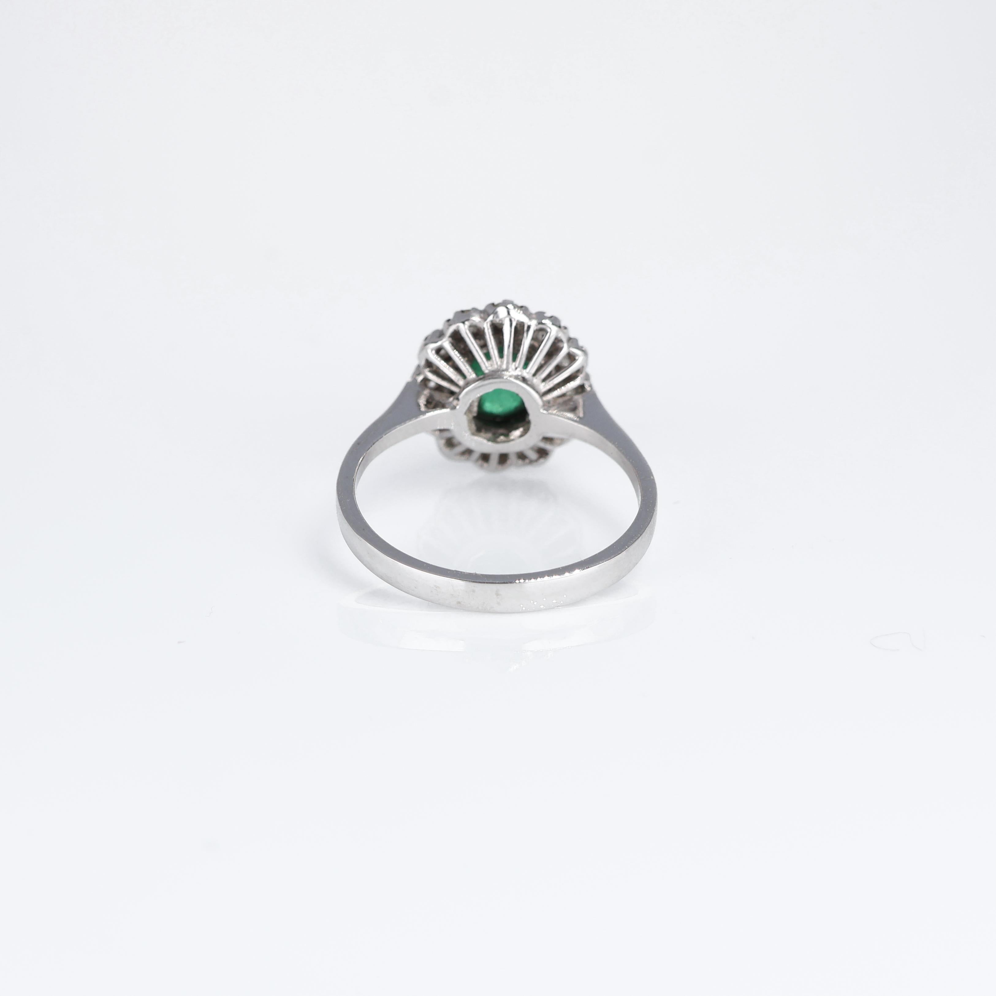 Classic Vintage Halo Ring Oval Emerald 0.45 carats and White Diamond White Gold For Sale 1