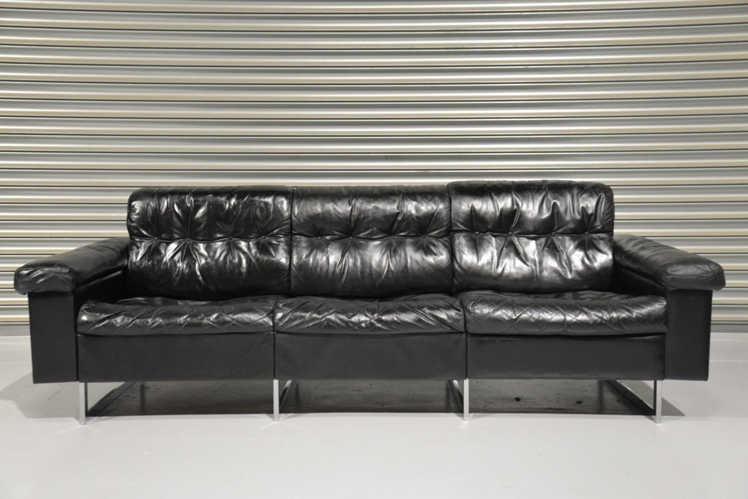 Discounted airfreight for our US and International customers ( from 2 weeks door to door )

A vintage de Sede three-seat sofa in stunning black leather. Hand built in he 1970`s by de Sede craftsman in Switzerland, this original sofa stands on