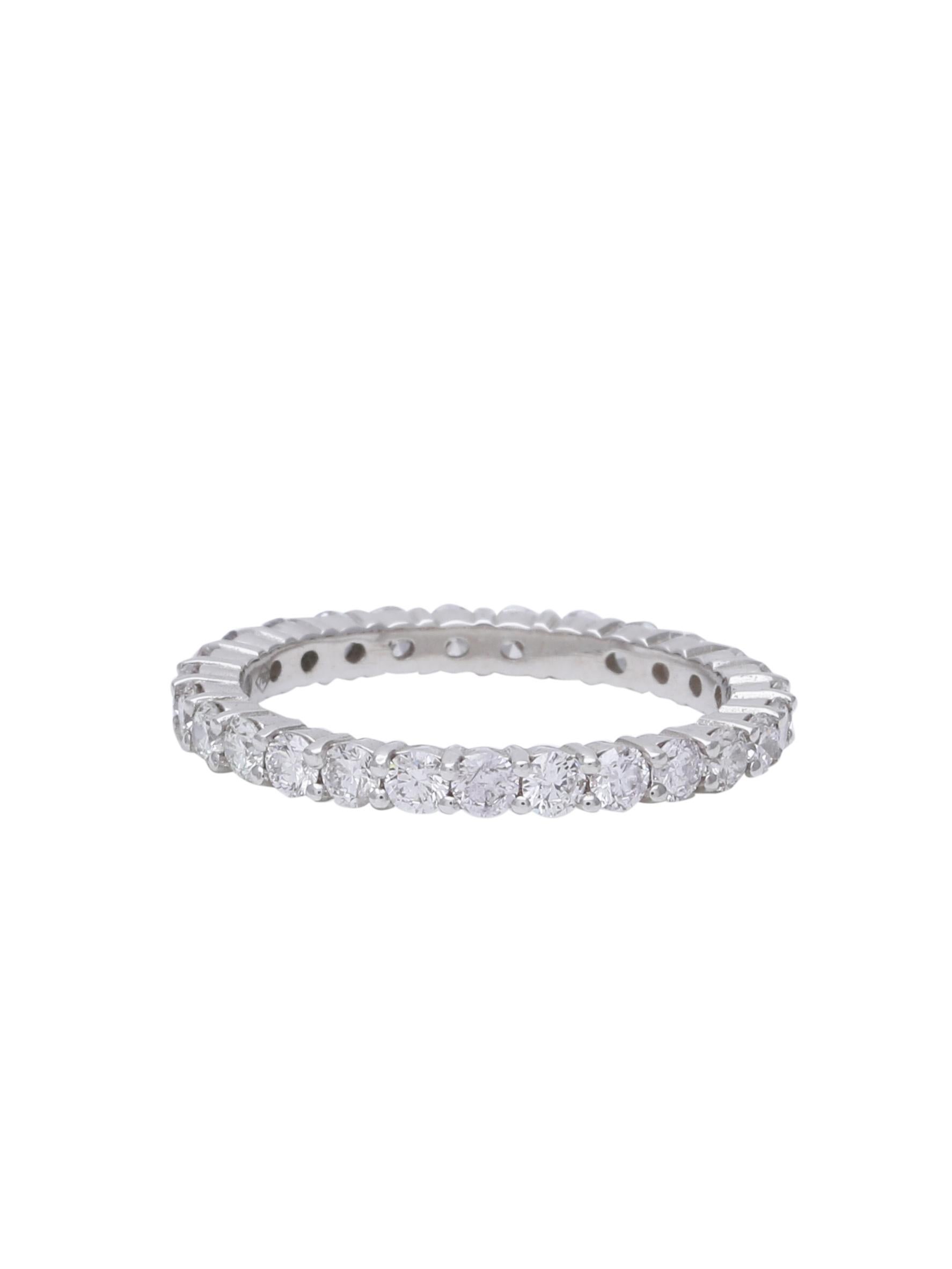 A classic Round Diamonds Eternity band in 18K white Gold. Diamonds weighing 1.14 carats total. The diamonds are all white and good quality. You could wear them as singles or stack them with some other colours.

Great as a wedding band or just a gift