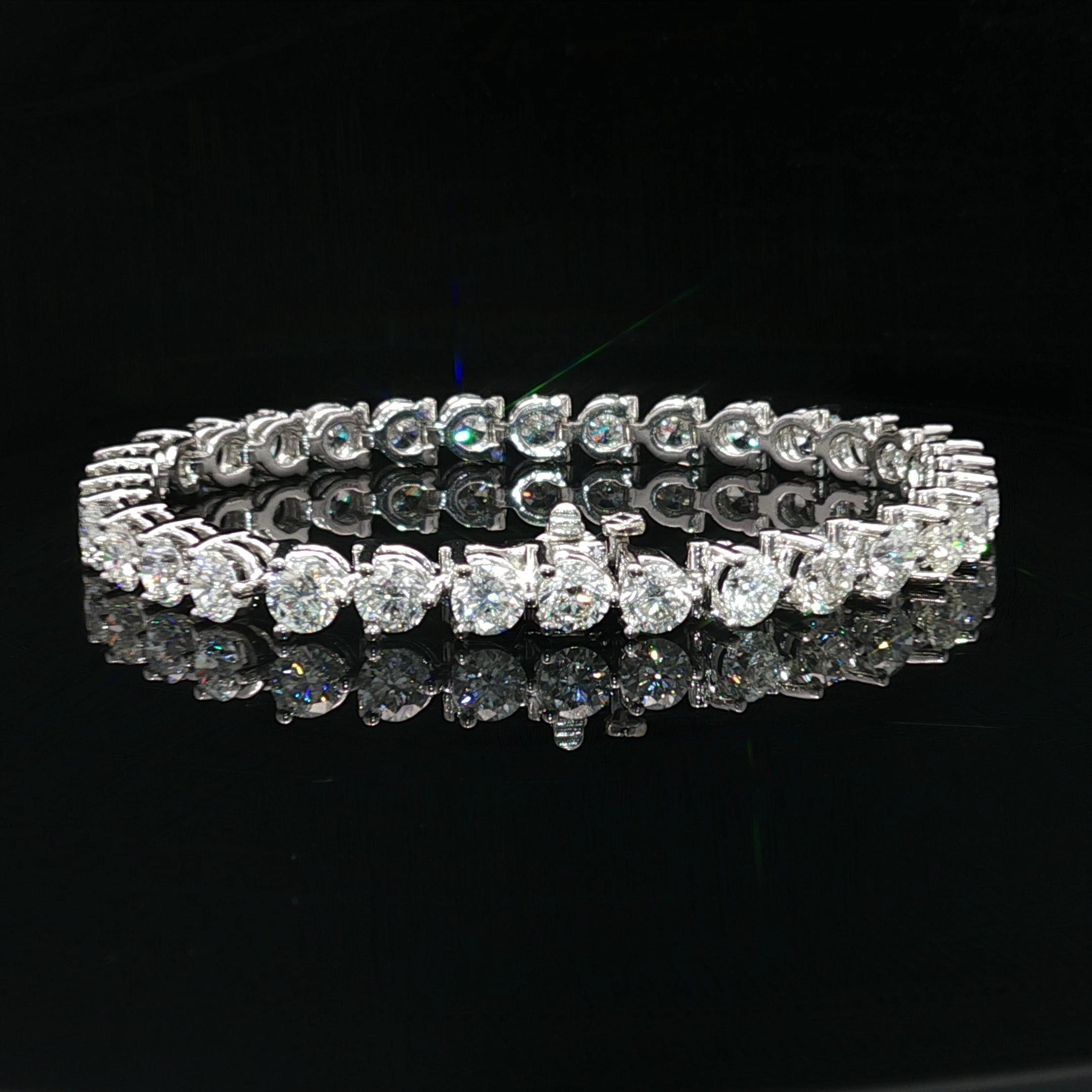 -A. Stone
(33) Diamanti naturali autentici - Grandi - Taglio rotondo brillante - Incastonati - Brillante - Colore G/H - Purezza I1/I2 - 11ctw (circa) 

Materiale: Oro bianco massiccio 18k
Peso: 20,49 grammi
Tipo: A Link Tennis
Lunghezza: Misura