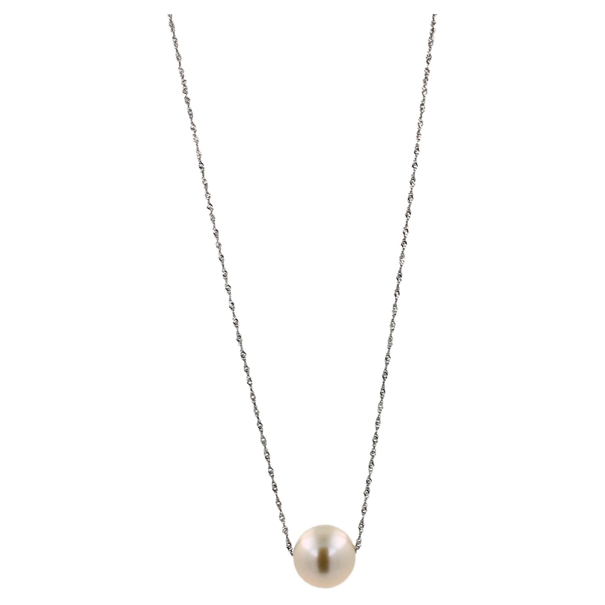 White Pearl 
14 Karat White Gold
Adjustable Length High-Finish Chain
High Quality Pearl with Beautiful Shine, Luster, Size & Brilliance
Classic, Minimalistic Design 
