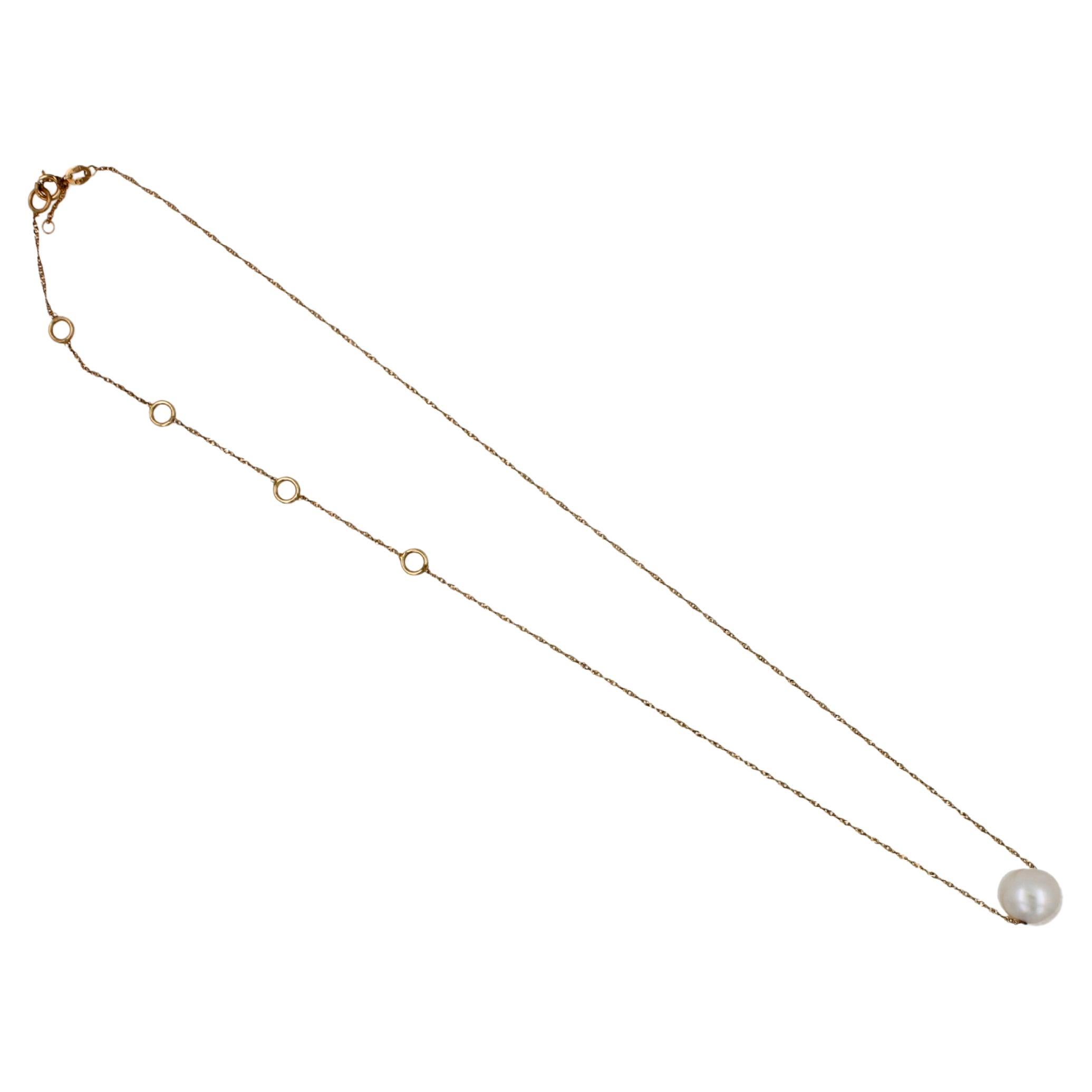 White Pearl 
14 Karat Yellow Gold
Adjustable Length High-Finish Chain
High Quality Pearl with Beautiful Shine, Luster, Size & Brilliance
Classic, Minimalistic Design 