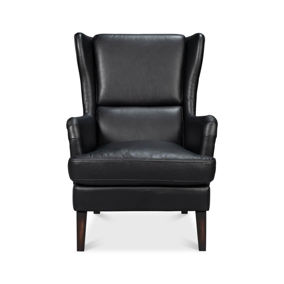 With traditional top grain black onyx leather, with high classic wingback backrest and boxed cushion seat raised on tapered legs.

Dimensions: 28