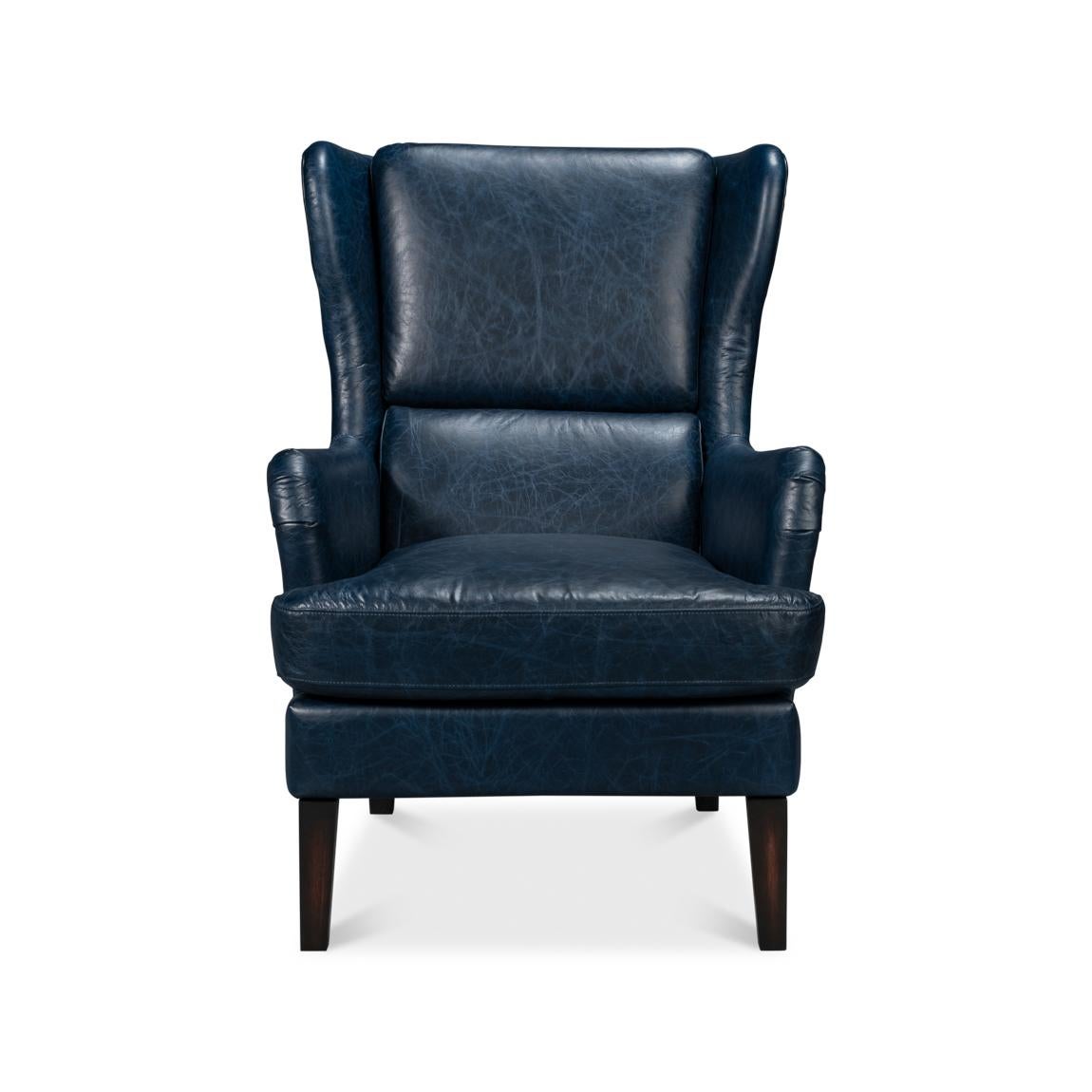 With the Chateau Blue traditional top grain Vintage style leather, with high classic wingback backrest and boxed cushion seat raised on tapered legs. 
Dimensions: 28