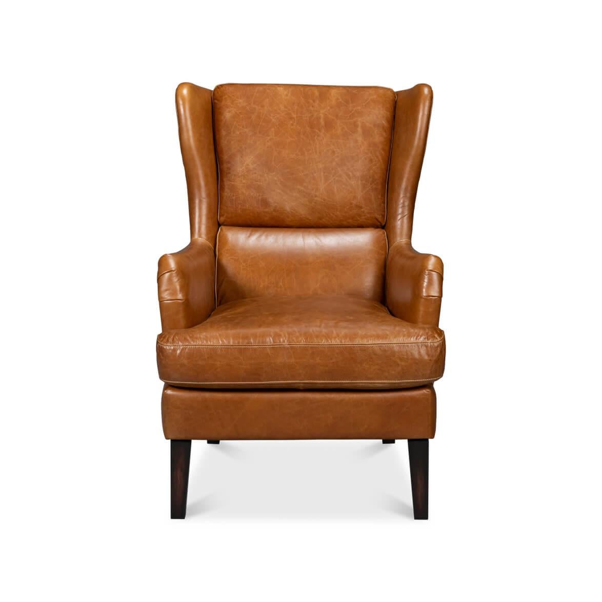 With the Cuban brown traditional top grain Vintage style leather, with high classic wingback backrest and boxed cushion seat raised on tapered legs. Dimensions: 28