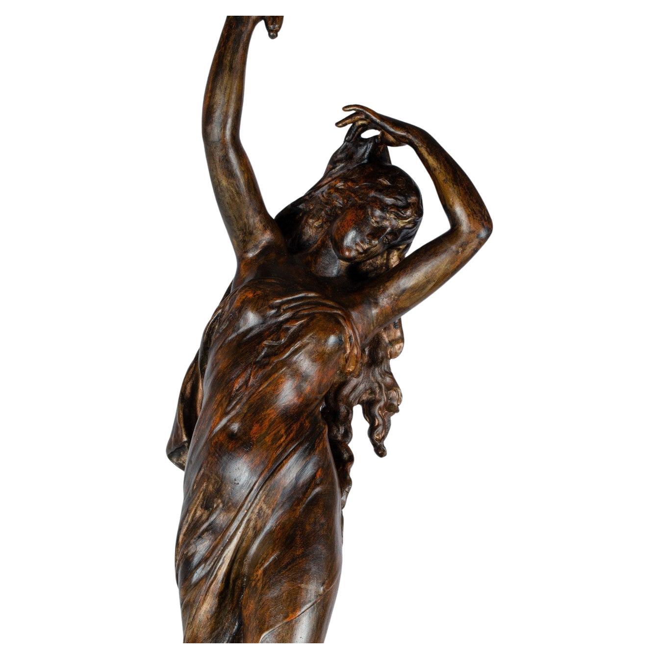 Classic Woman Sculpture Lamp by Val D' Osne
Bronze sculpture lamp from the late 19th century, which represents a woman in Greco-Roman period costumes, carrying light in her hand with a lampshade that gives the sensation, due to its shape, that she