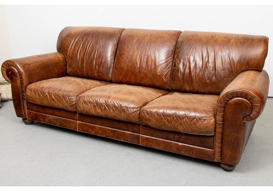 Classic Worn Leather Three Seat Sofa In Distressed Condition For Sale In Bridgeport, CT