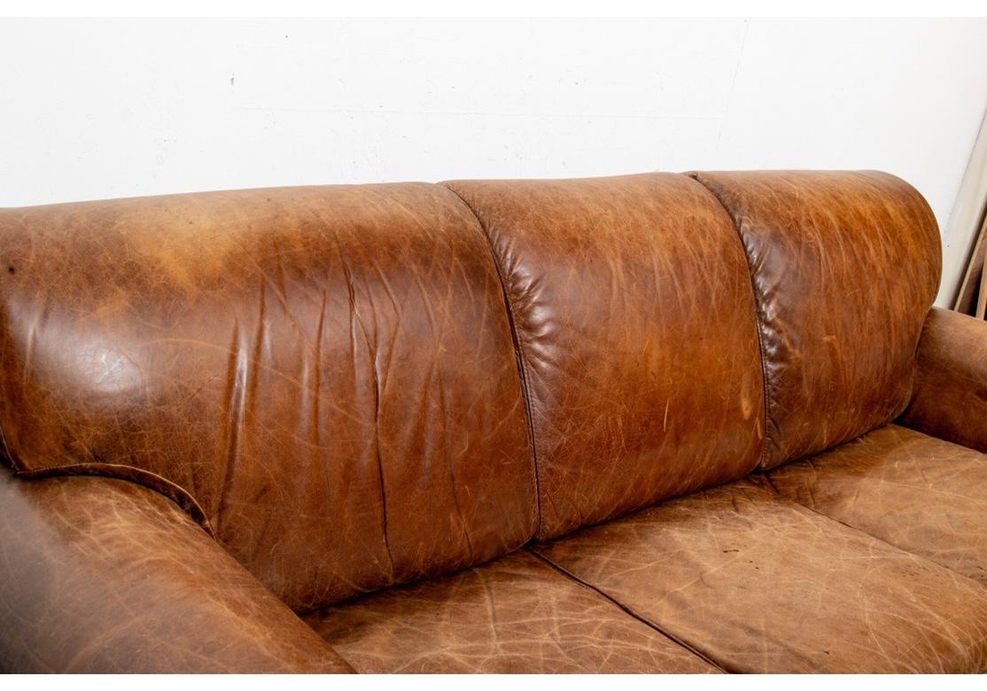 20th Century Classic Worn Leather Three Seat Sofa For Sale