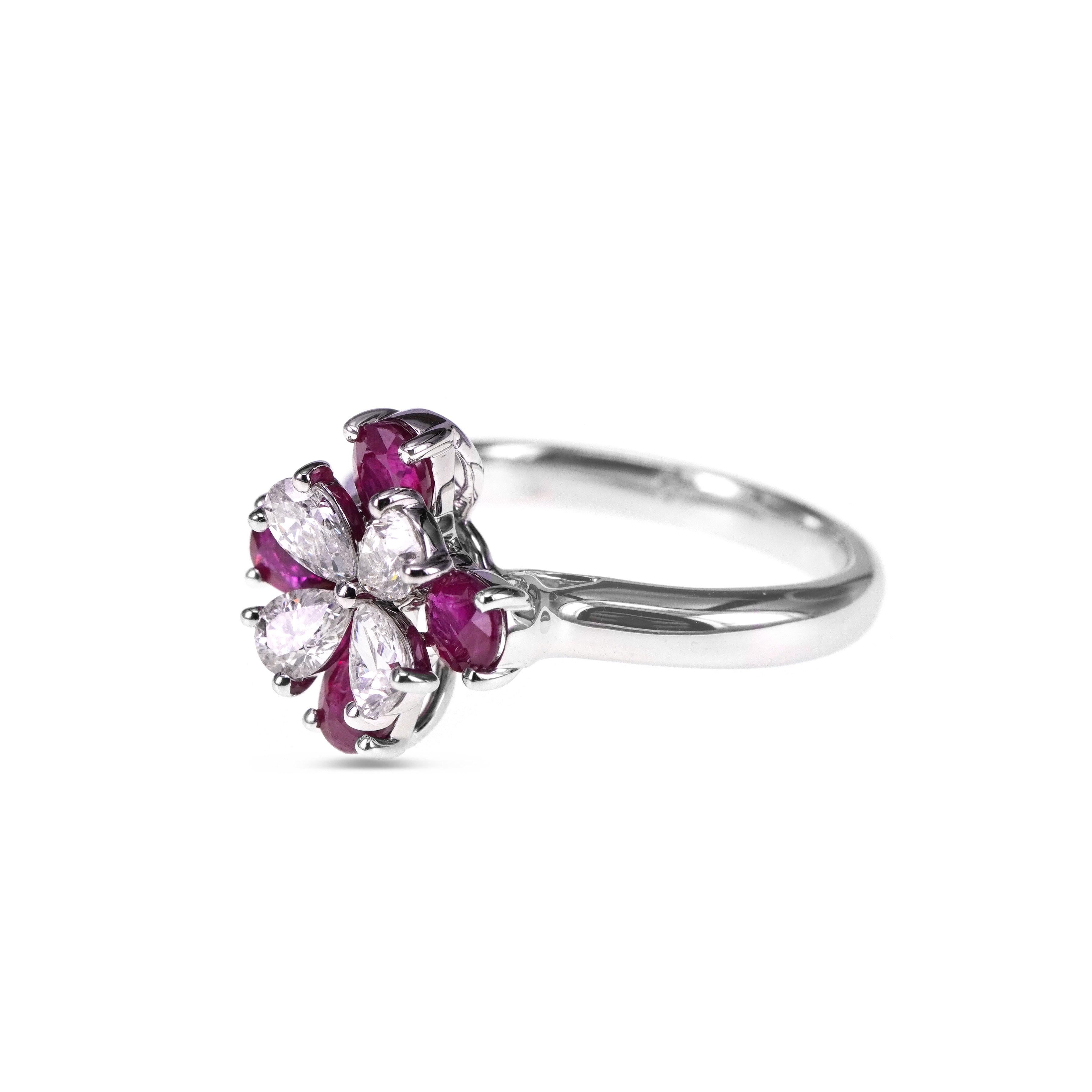 A classical combination of 1.02 carats of vivid red ruby and 0.52 carat of pear shape brilliant white diamond sits prettily on the finger. 
The details of the ring are mentioned below:
Color: F
Clarity: Vs
Ring Size: US 6.5
Ring size can be changed