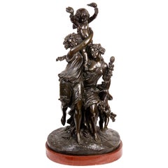 Classical 19th Century Bronze Group of Two Maidens Carry a Cherub