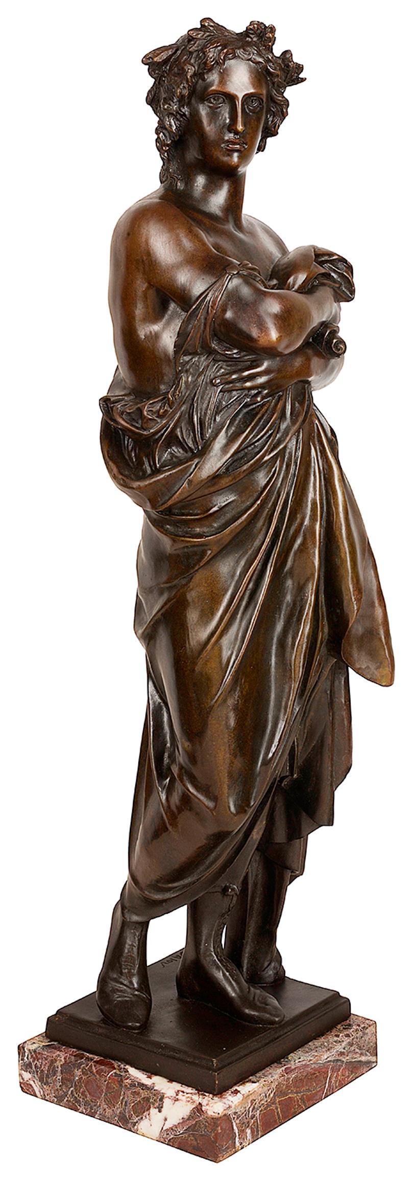 A very good quality 19th century French patinated bronze statue of a classical Roman scholar, dressed in a toga and holding a scroll. Measures: 73cm (28.5