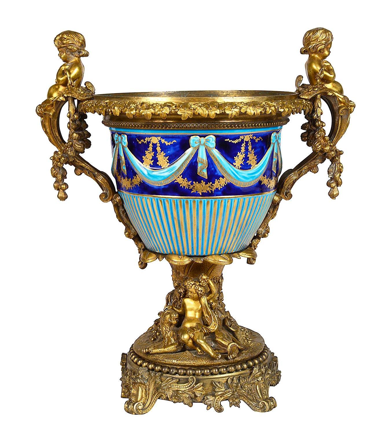 Classical Greek Classical 19th Century French Majolica porcelain and ormolu urn. For Sale