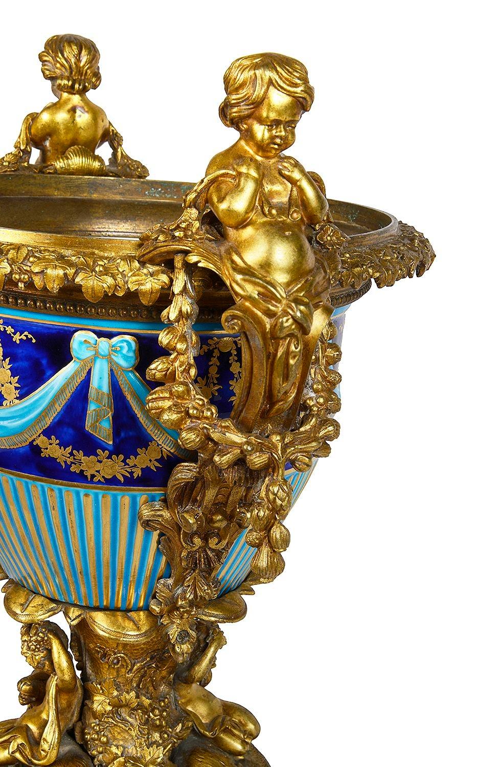 Gilt Classical 19th Century French Majolica porcelain and ormolu urn. For Sale