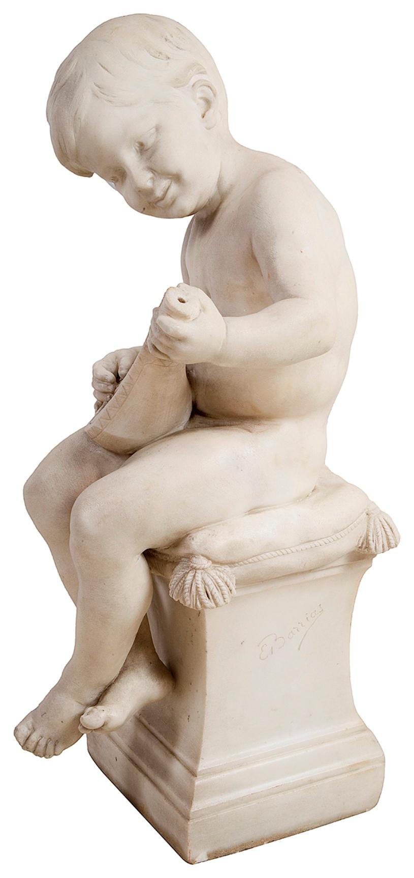 A fine French statuary marble figure of a child sitting upon a cushioned pedestal playing a lute. Measures: 64cm (25