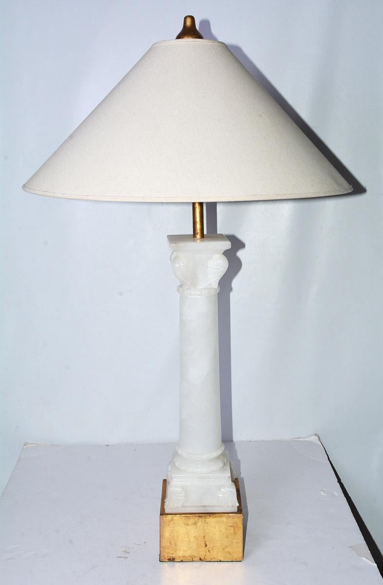 Monumental neoclassical carved Italian alabaster lamp in the shape of a column. Price for lamp with or without shade.
Measures: Lamp shade top 4.75