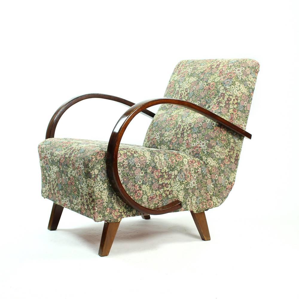 Beautiful armchairs in classical design of Jindrich Halabala. Produced in Czechoslovakia in 1950s. Unique design of the armrests with great detail. This is a trademark for Halabala and most of his designs. He always took a great care of the armrest