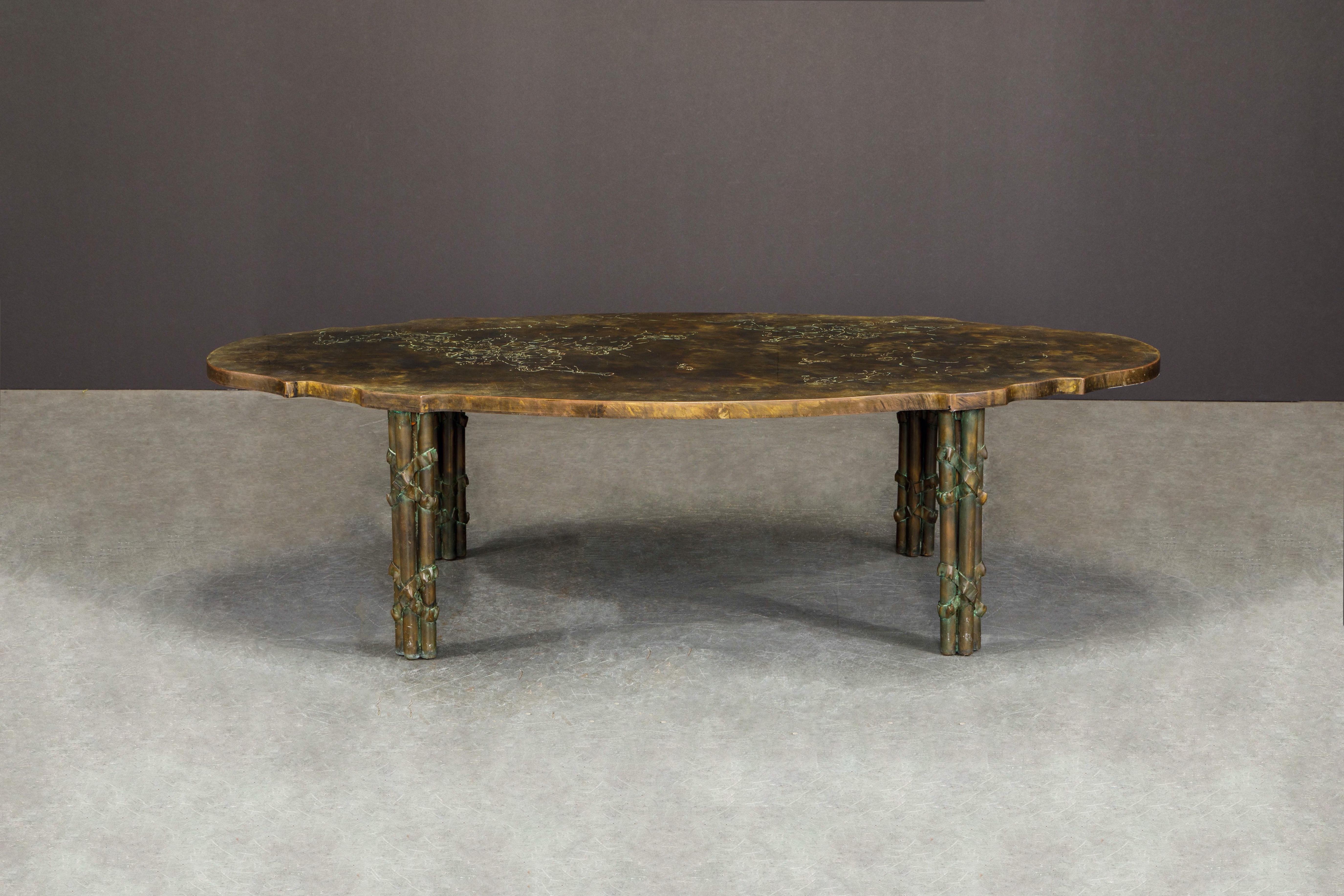 This is an excellent collectors example of the rare and sought after 'Classical Boucher' sculpted oval cocktail table by father and son team, Philip and Kelvin LaVerne, produced in the 1960s. Ingeniously designed with hand carved burnished bronze