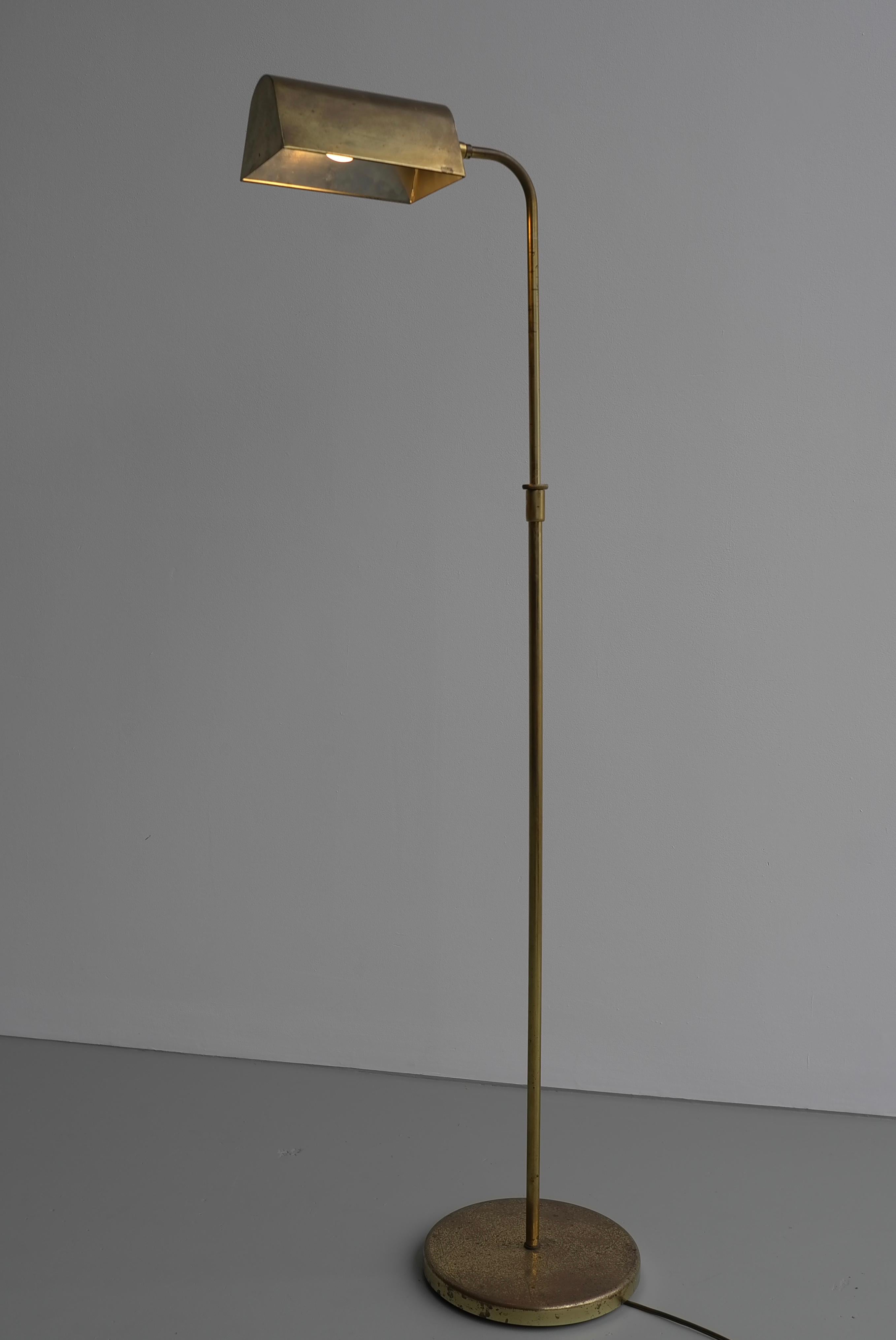 Classical brass adjustable library reading floor lamp, 1960s.