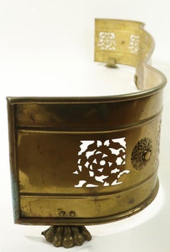 Classical Brass Serpentine Form Fireplace Fender with Hairy Paw Feet