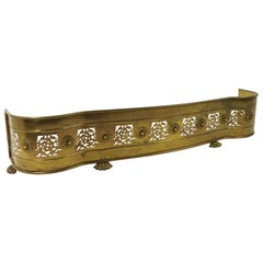 Classical Brass Serpentine Form Fireplace Fender with Hairy Paw Feet