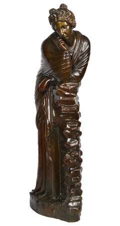 Classical Bronze maiden resting on a rock, 19th century