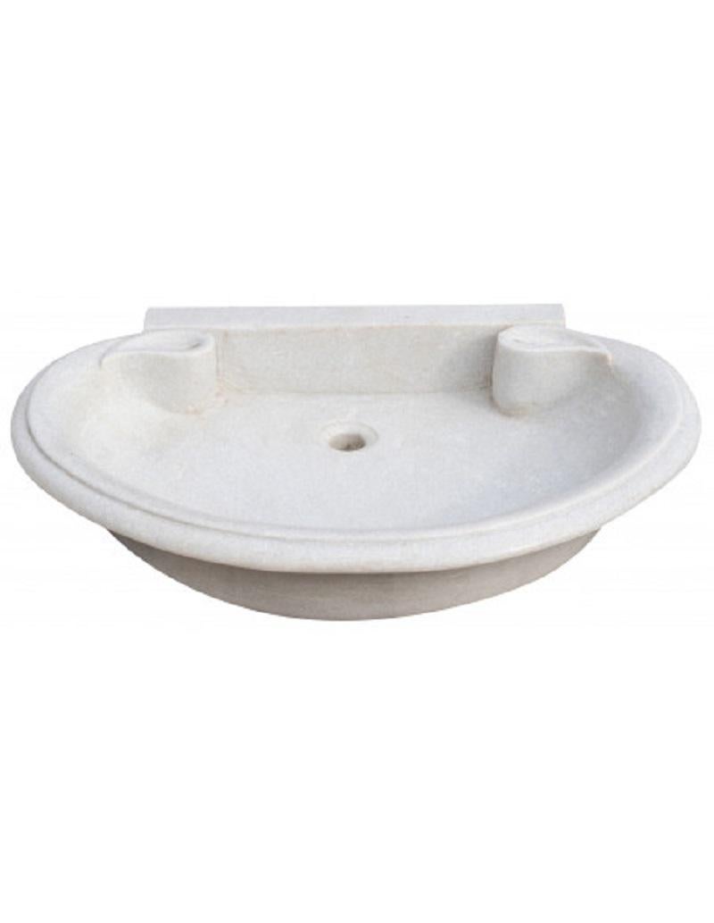 This timeless beautiful Italian classical sink is cut from one single block of white Carrara marble, the design has not changed since Greek and Roman times, it carries superb artistic merit easily fitting in with old and new buildings. 
It also