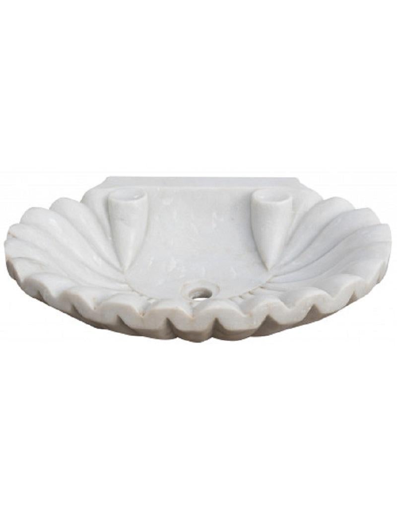 This timeless beautiful Italian classical sink is cut from one single block of white Carrara marble, these designs have not changed since Greek and Roman times, it carries superb artistic merit easily fitting in with old and new buildings.
It also