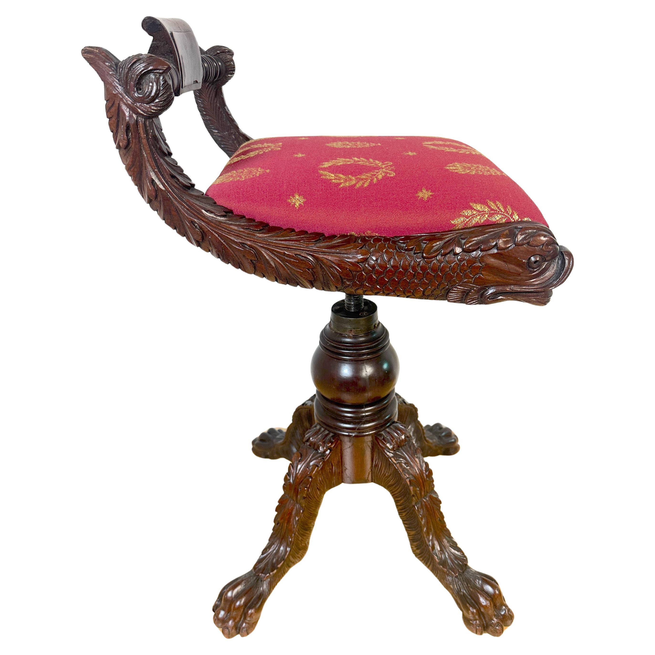 Classical Carved Hardwood Piano Stool with Dolphins, New York, circa 1825

A truly exceptional classical carved hardwood piano stool with dolphins, originating from New York circa 1825. This piece stands as a testament to the rare and exquisite