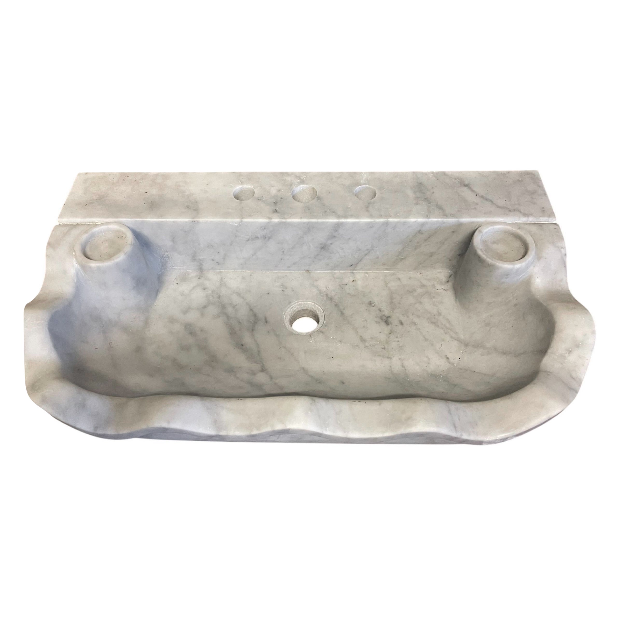 Lavandino classico in marmo intagliato