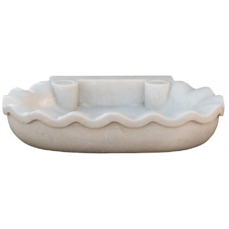 This timeless beautiful Italian classical sink is cut from one single block of white marble, these designs have not changed since Greek and Roman times, it carries superb artistic merit easily fitting in with old and new buildings. 
It can also