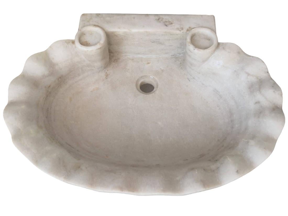 This timeless beautiful Italian classical sink is cut from one single block of white marble, these designs have not changed since Greek and Roman times, it carries superb artistic merit easily fitting in with old and new buildings. 



