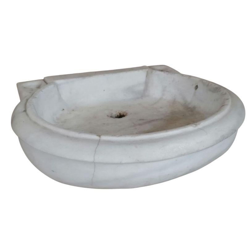 This period Italian classical shell sink is cut from one single block of white marble, these designs have not changed since Greek and Roman times, it carries superb artistic merit easily fitting in with old and new buildings. 
Limited stock



